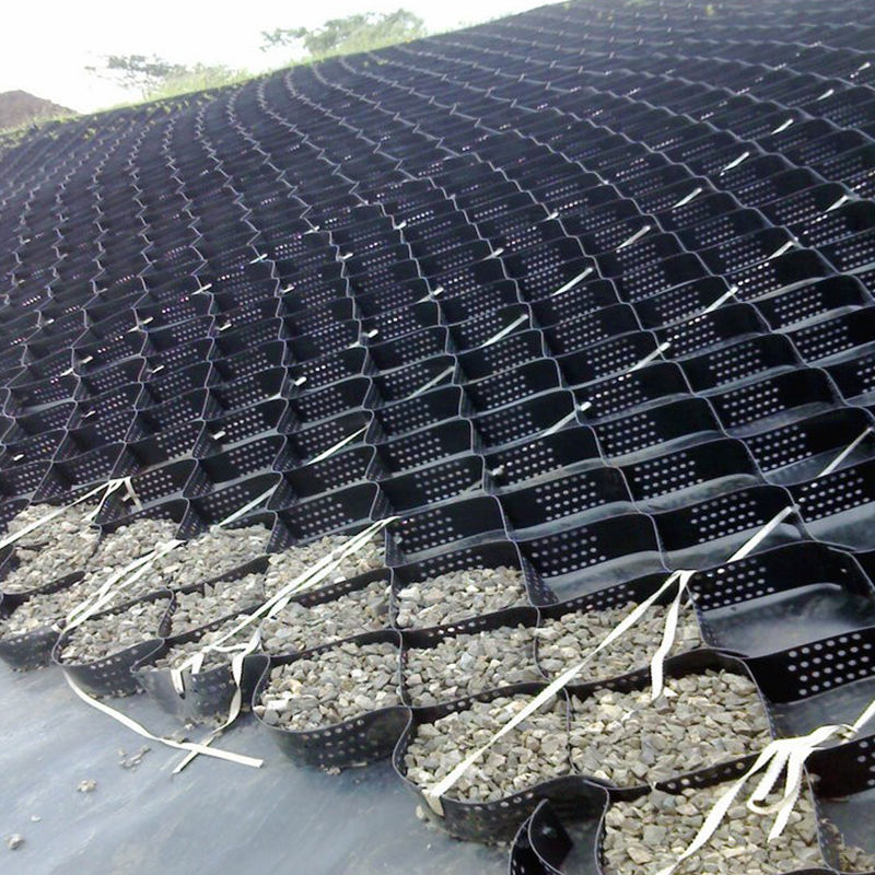 টেক্সচার্ড এবং ছিদ্রযুক্ত HDPE প্লাস্টিক জিওসেল গ্রিড যা ড্রাইভওয়ের স্থিতিশীলতা, রাস্তার ভিত্তি শক্তিশালীকরণ, পার্কিং লট এবং ঢাল রক্ষার জন্য ব্যবহৃত হয়